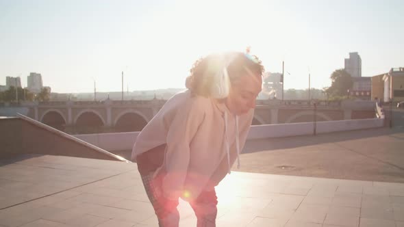 Female Athlete Taking Breath While Jogging