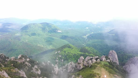 Ffy Through The Clouds Over The Mountains