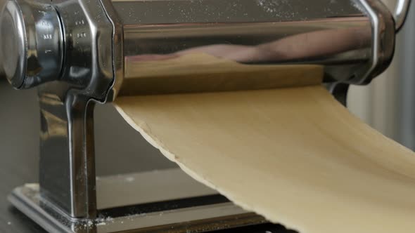 Lasagne making from dough 4K 2160p 30fps UltraHD footage - Manual machine and Italian pasta close-up