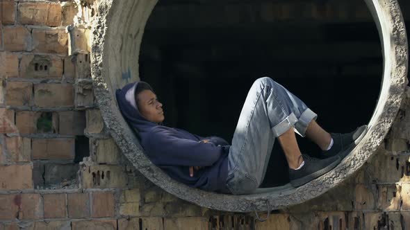 Desperate Lonely Male Teen Thinking of Problem Abandoned Building, Difficulties