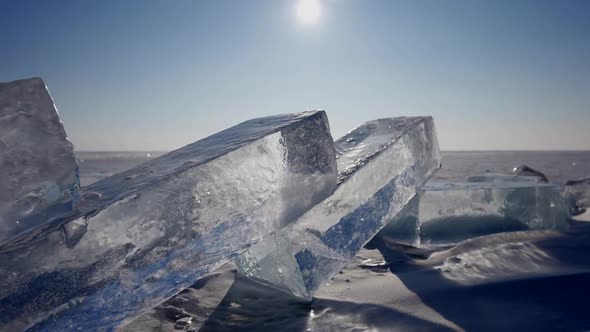 Large Ice Cubes on Seashore Ice Figure Show and Art Amazing Natural Landscape
