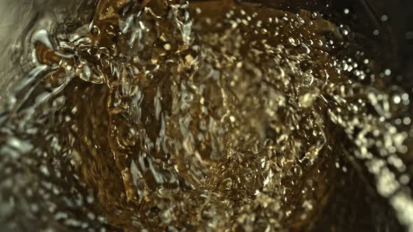 Super Slow Motion Abstract Shot of White Wine Pouring in Glass Bottle at 1000 Fps