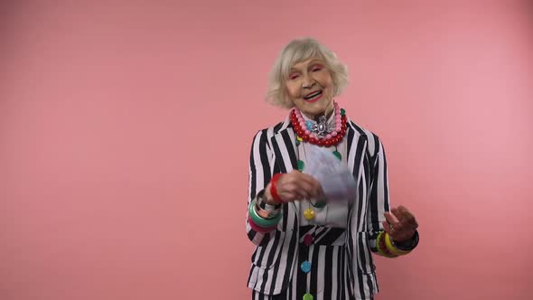 Funny grandmother in studio