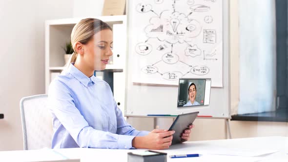 Businesswoman Having Video Call on Tablet Computer 87