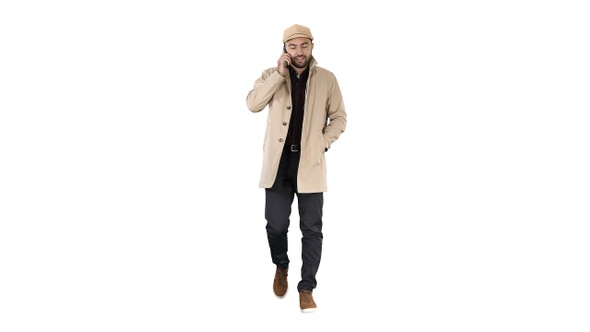 Man in Trench Coat Walking and Talking on The Phone On