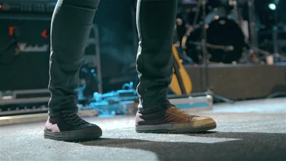 Classic Black and White Sneakers Shoe Musician at the Rock Festival Concert on Stage