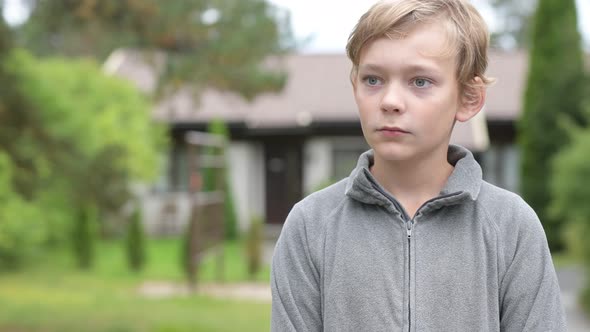 Young Happy Handsome Boy Thinking At Home Outdoors