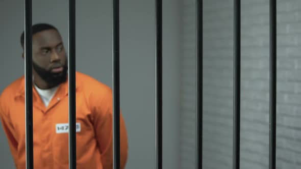 Afro-American Prisoner Making Arrangement With Prison Guard, Corruption in Jail