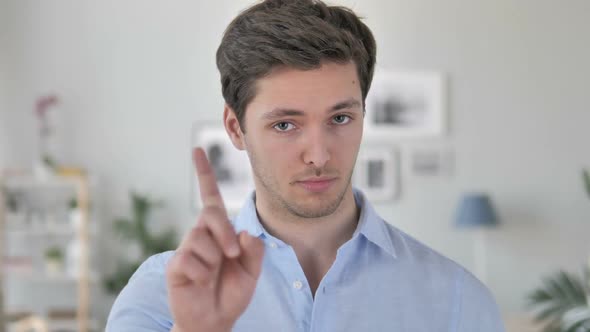 No Handsome Young Man Rejecting Offer By Waving Finger