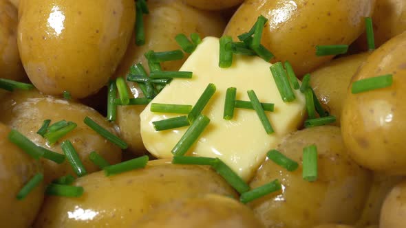 Chives Sprinkled On Potatoes And Butter