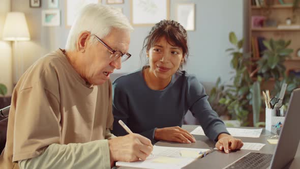 Helping Elderly Man To Learn Something