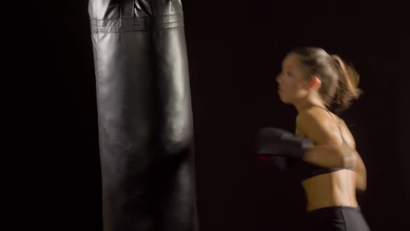 Athletic Woman Boxing Punching-Bag