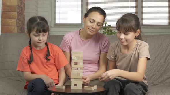 Game of Assembling Pyramid