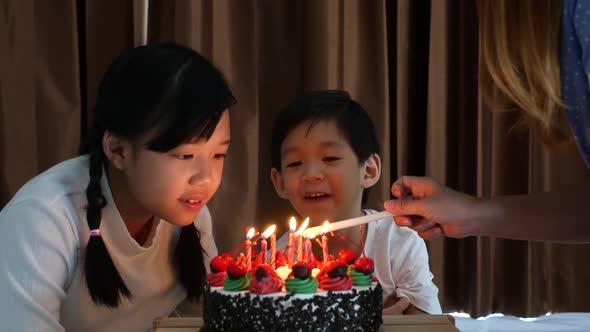 Asian Children With Birthday Cake