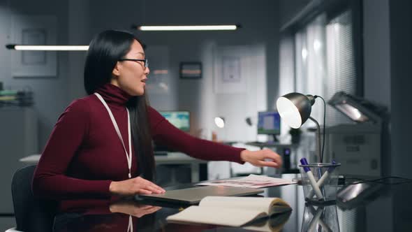 Young Korean Businesswoman Finish Work and Leave Office