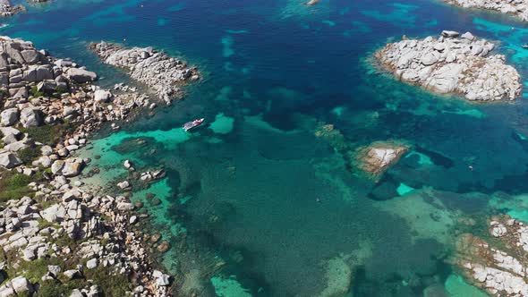 Aerial View of White Sand Beach Blue Sea Marine Vegetationwavestrees and White Rocks