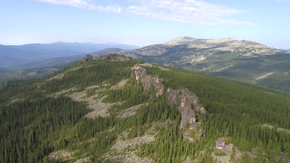 Flying over the mountain gorge and forest