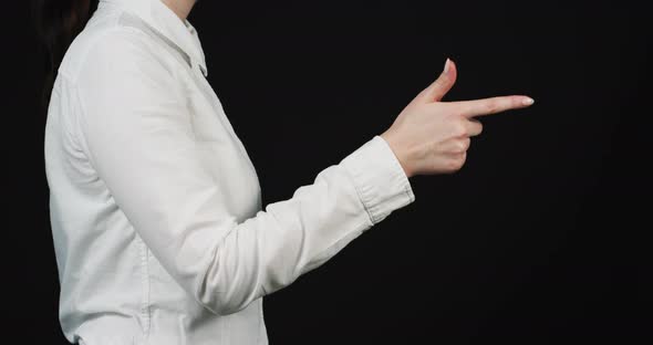 Side view of a woman's hand counting