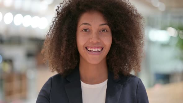 Beautiful Young African Businesswoman Showing OK Sign