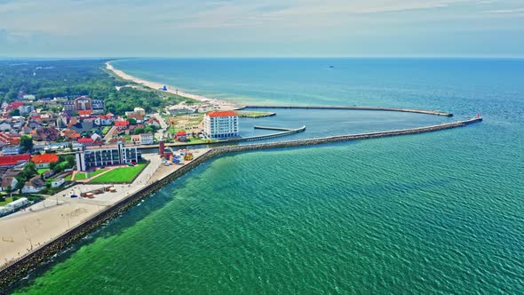 Flying above entrance to port in Darlowo, Baltic Sea