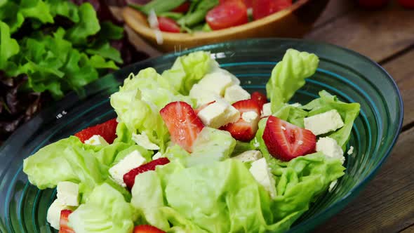 Oil being poured in salad