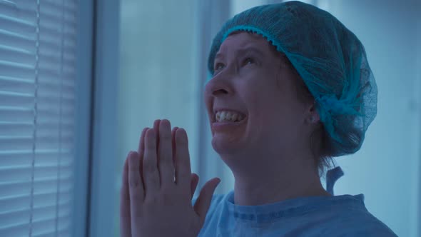 Nervous Patient at Hospital Praying for Good Results