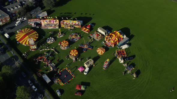 An aerial view of a fairground and circus in a field in Northern England