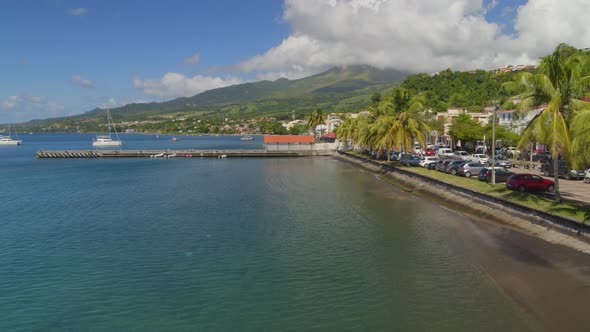 Jetty and parked cars on Caribbean Coast, Saint-Pierre