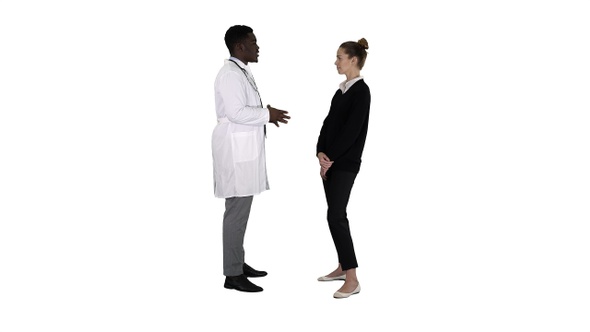 Male african doctor talking to female patient on white background.