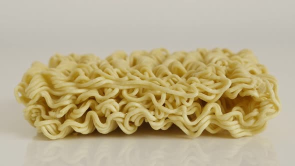 Instant staple food block   4K 2160p 30fps UltraHD tilting footage - Dried Chinese type of noodles s