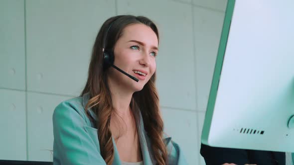 Business People Wearing Headset Working in Office