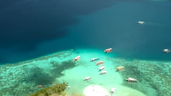 Aerial fly over of CYC beach on CYC Island, Coron town, Philippines