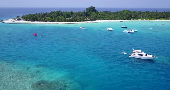 Natural overhead island view of a summer white paradise sand beach and aqua blue water background