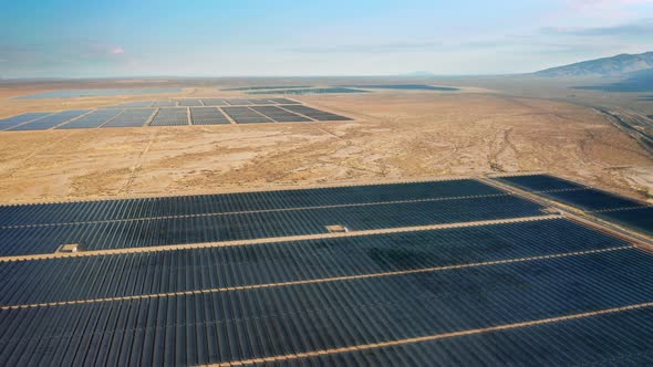 Aerial View of Huge Solar Power Farm for Energy Production Beautiful Sunny Day alt