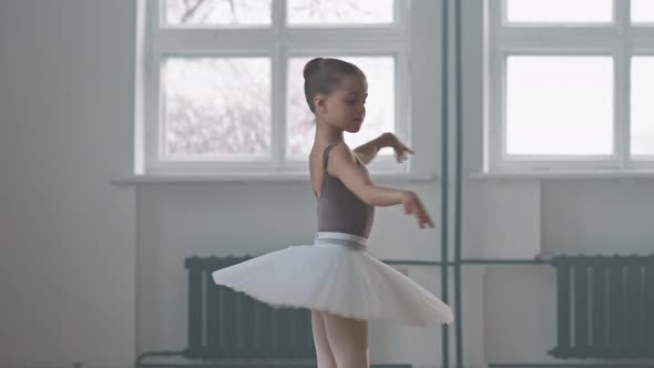 Talented Little Ballerina Dancing In Studio