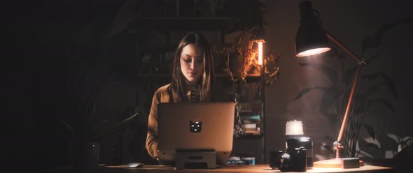 Woman works at desk