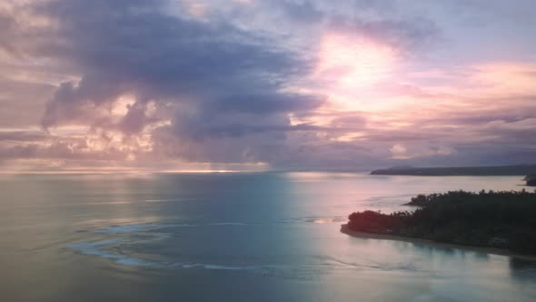 Dramatic Sea Sunset Aerial Timelapse Scenic Sky in Golden Pink Purple Clouds