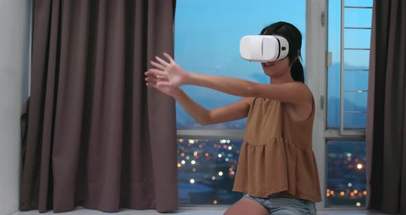 Woman watching with VR device 