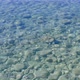 Aerial fly over ocean, start from low over shallow transparent water to open calm sea - VideoHive Item for Sale