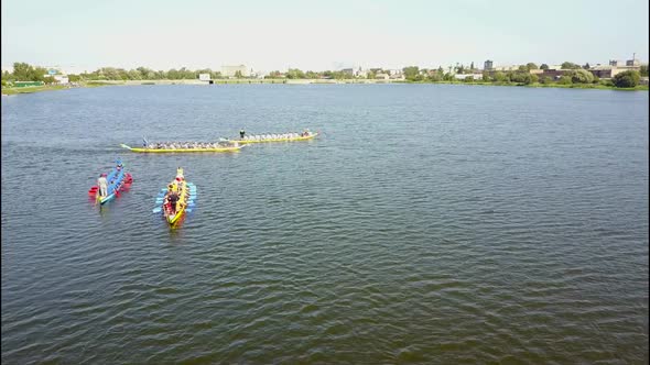 Close Up of a Men's Rowing Team at the Beginning of Their Race