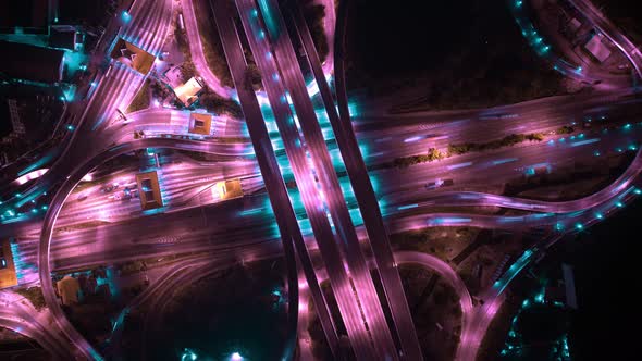 4K : Time lapse Aerial view and top view of traffic on city. Expressway with car lots