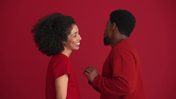 Happy African couple dancing