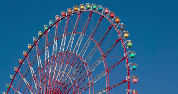 Ferris Wheel with clear blue sunny sky