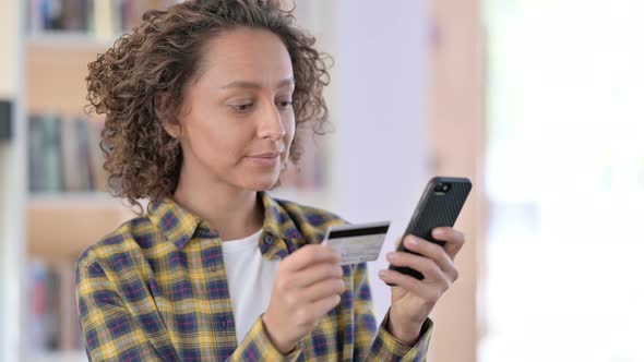 Portrait of Online Shopping on Smartphone By Mixed Race Woman