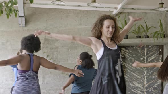 Dance Teacher Rehearsing with Young Women