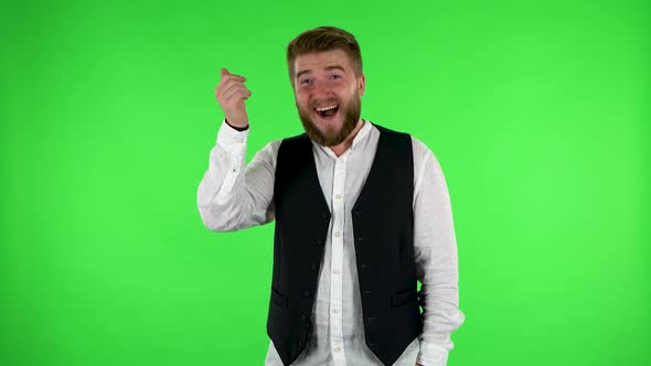 Man Waving Hand and Showing Gesture Come Here. Green Screen