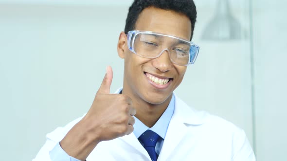 Thumbs Up by Afro-American Scientist, Doctor