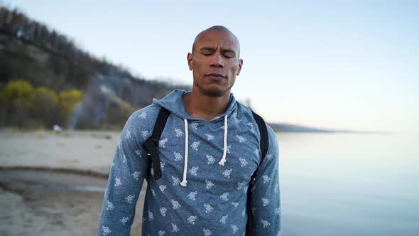 Man thinking about life on a beach