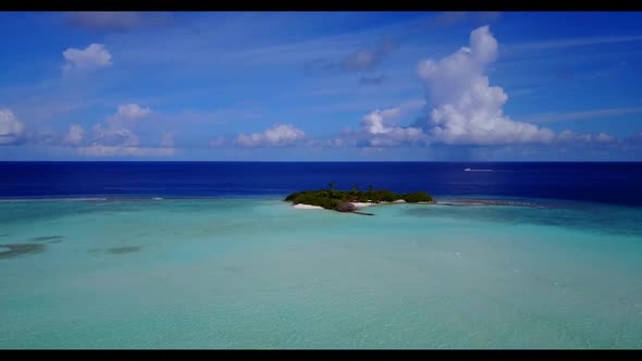 Aerial top view panorama of idyllic lagoon beach wildlife by clear sea and white sandy background of