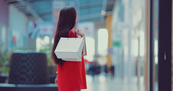 Portrait of an Attractive Woman in a Shopping Center